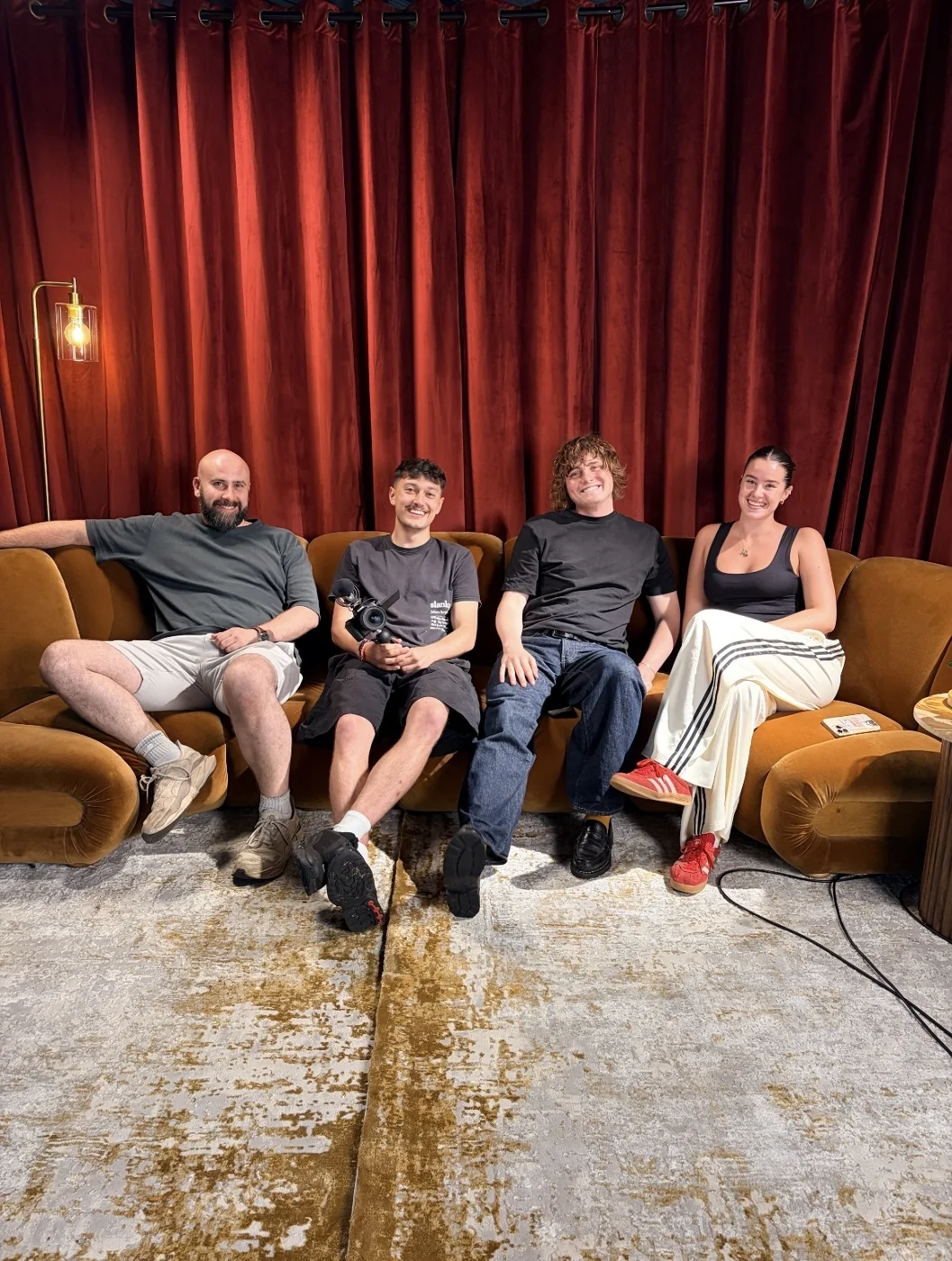 Four people together after a filming session